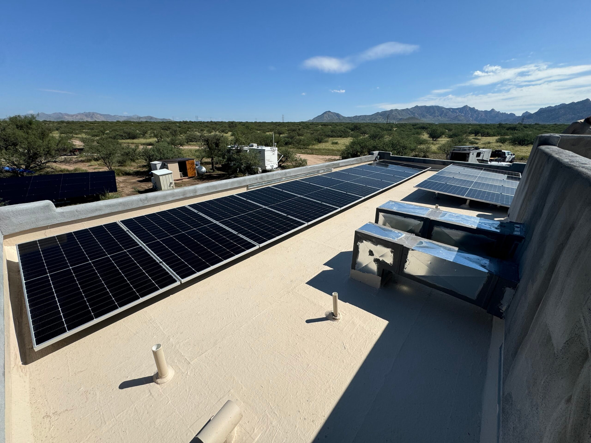 Rooftop solar array with Dragoon Mountains views