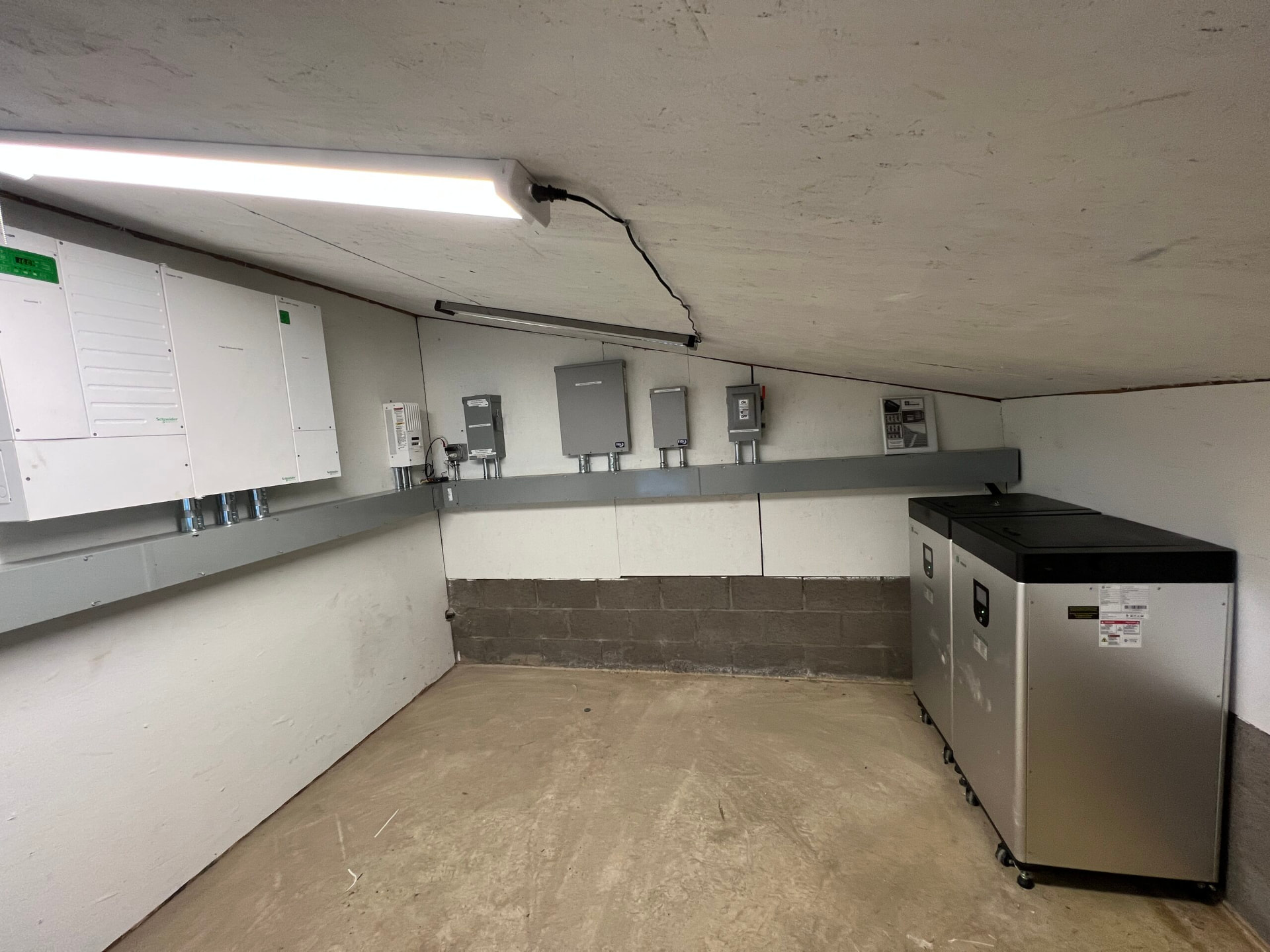 Inverter and battery wall in the property power room