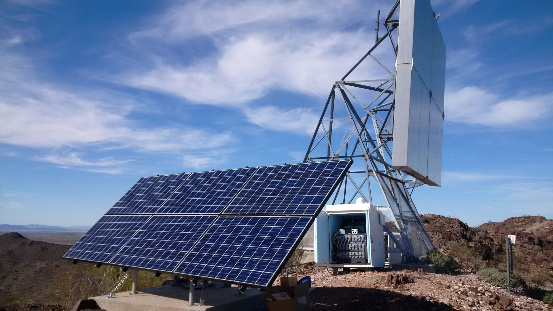 Solar array and radio tower at the mountaintop telecom site