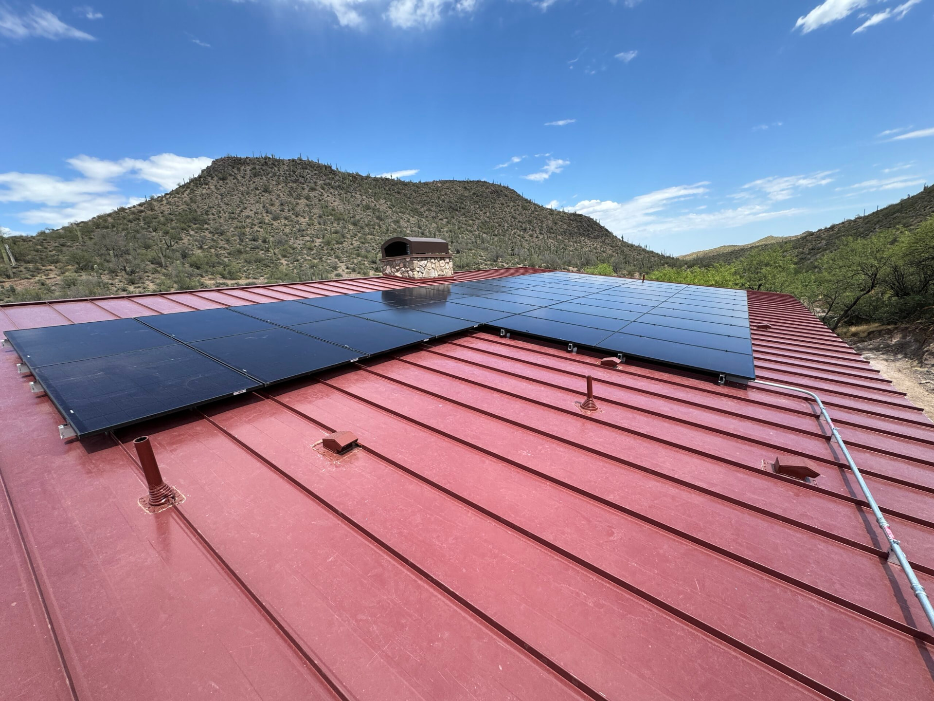 Roof-mounted solar panels at the retreat